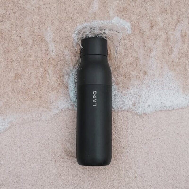 Self cleaning bottle