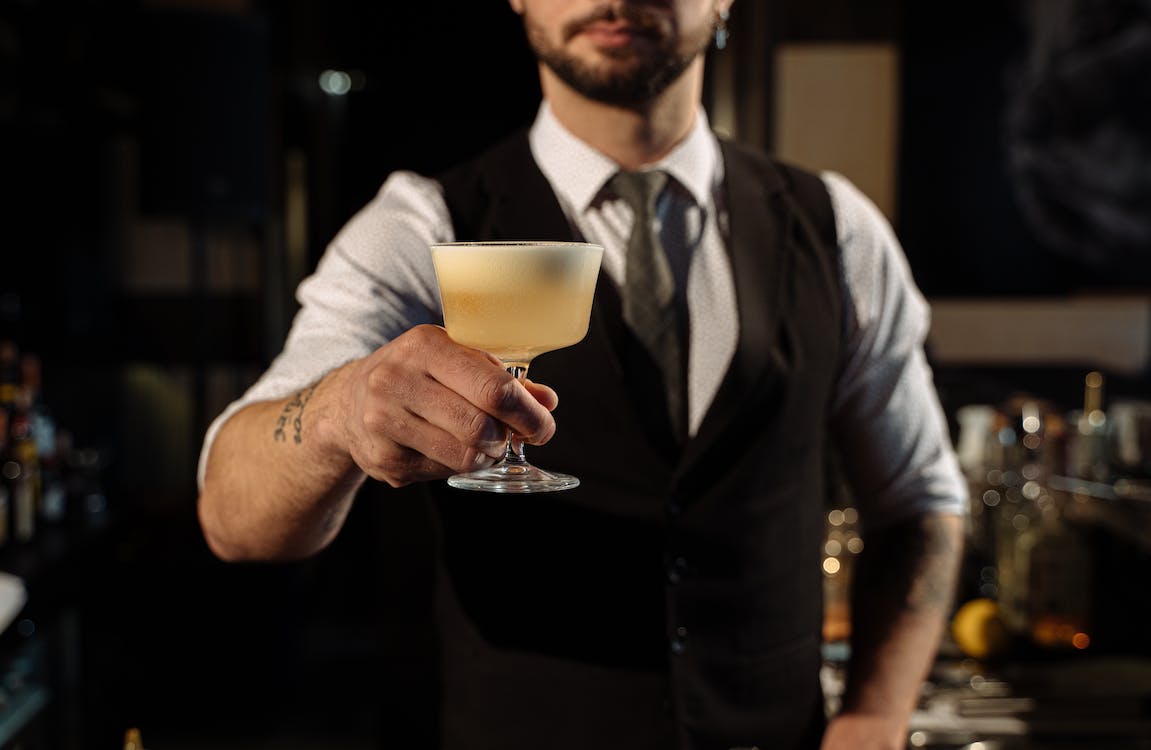 Bartender Holding a Cocktail